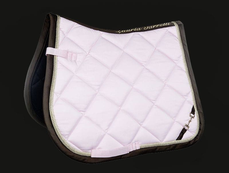 Stunning white saddle pads. Showing your horse at its best.